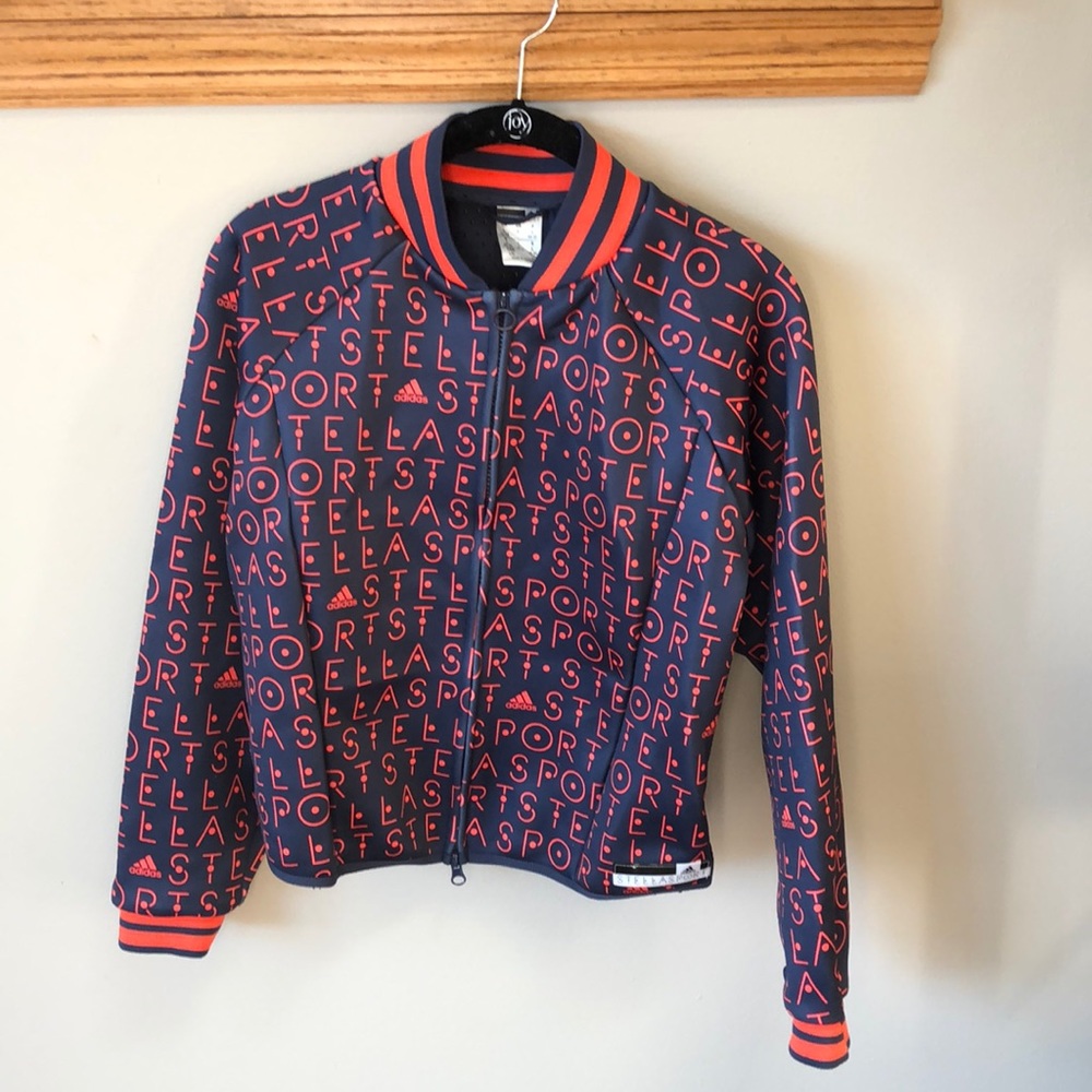 Adidas zip up with a jersey-like back detail